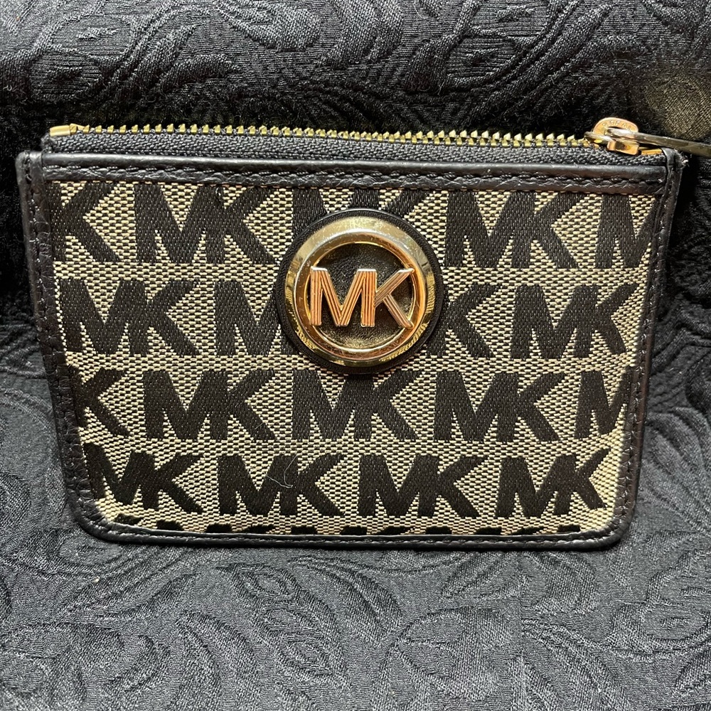 Micahael Kors wristlet wallet gentle used